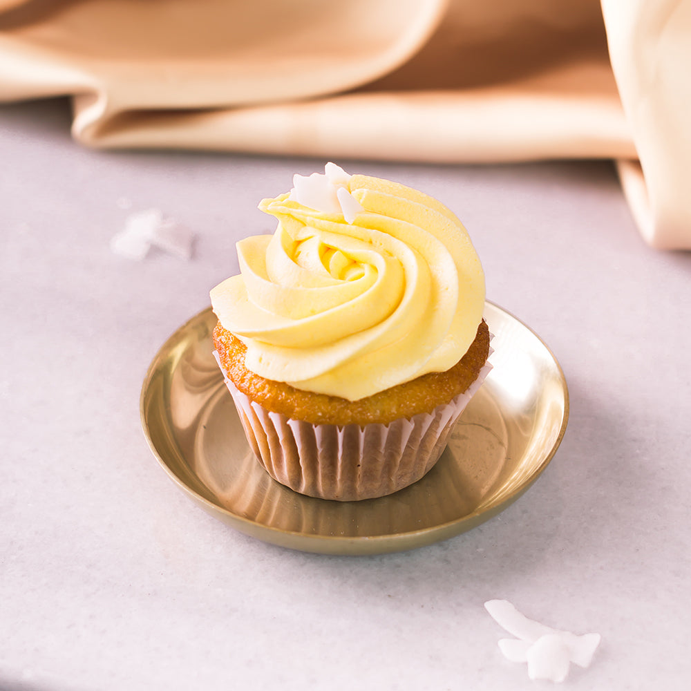 Transport yourself to a tropical paradise with a delicious mango cupcake, topped with creamy frosting and a sprinkle of diced mango. Pair it perfectly with a crisp and refreshing Brut Cava, with its bright fruit notes that complement the cupcake&