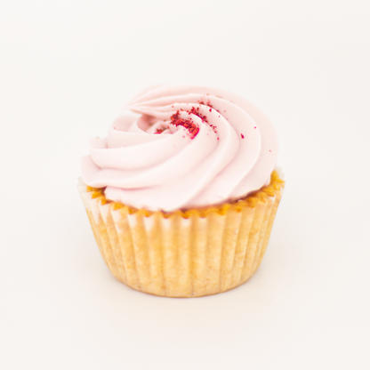 Indulge in a delightful raspberry cupcake, with its sweet and tangy flavor and a dollop of creamy frosting. Pair it perfectly with a crisp and refreshing Brut Cava, with its bright fruit notes that complement the cupcake&